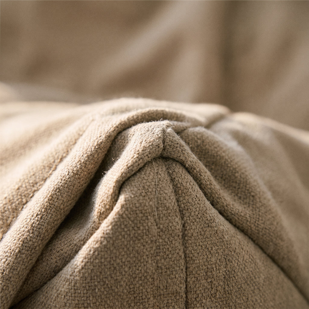 La toile de coton du pouf vue de près