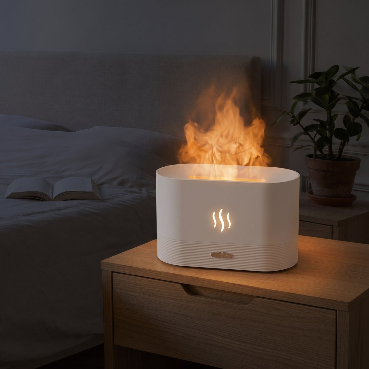 Diffuseur à effet flamme blanc posé sur une table de nuit