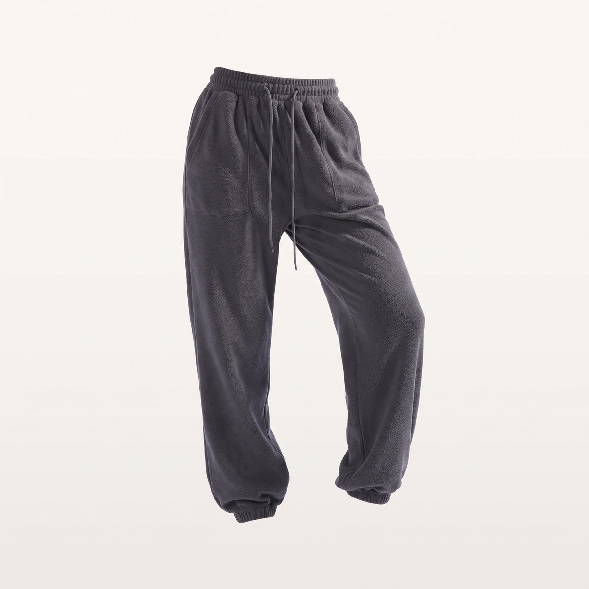 Jogging femme gris foncé détouré sur fond uni
