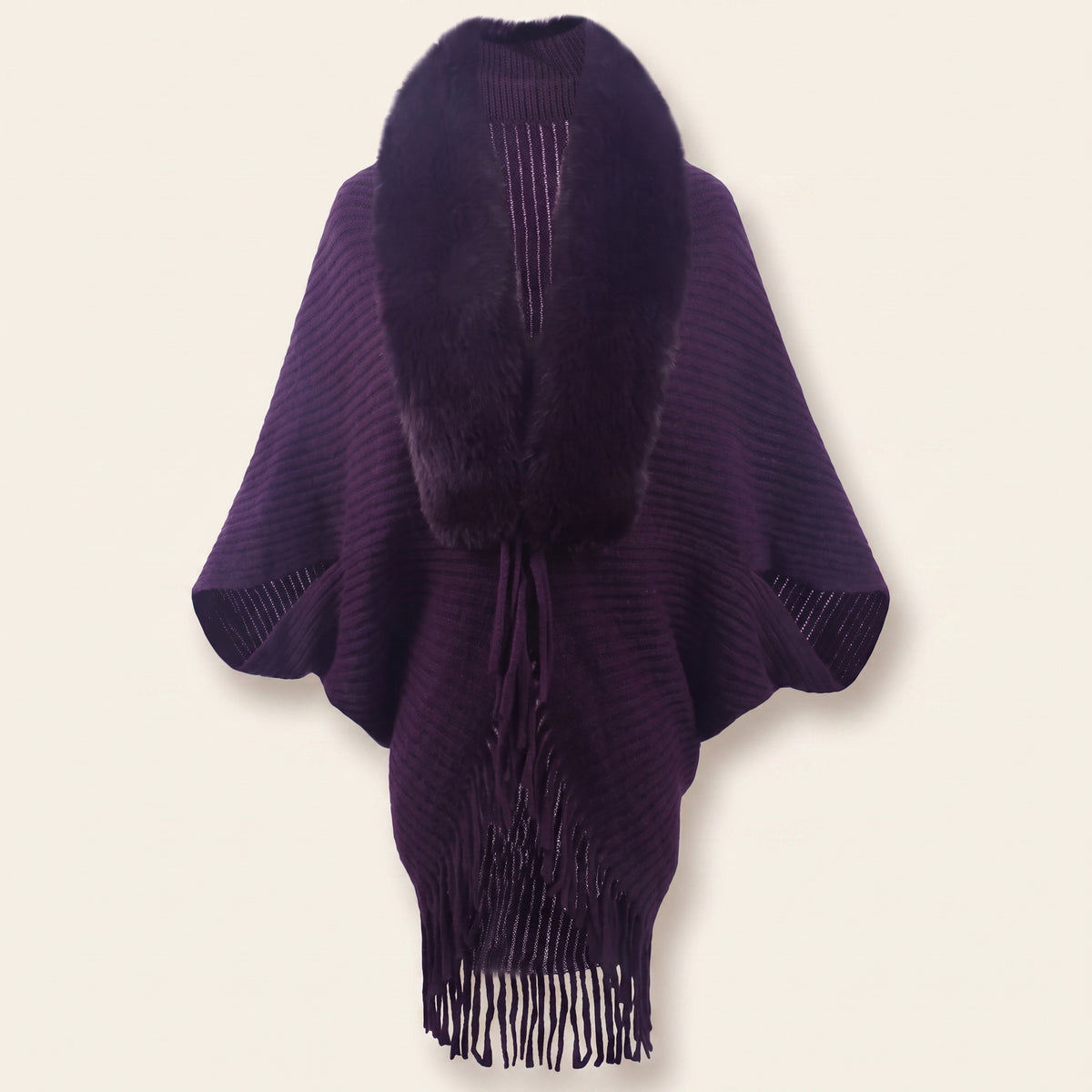 Poncho violet en maille côtelée vu de face sur mannequin invisible