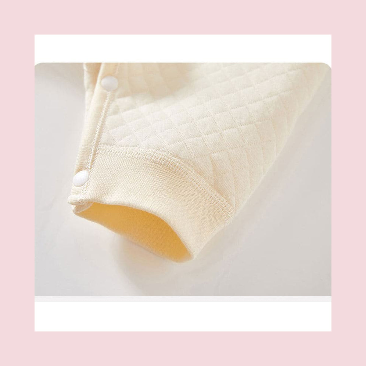 Bas de jambe de la barboteuse bébé beige