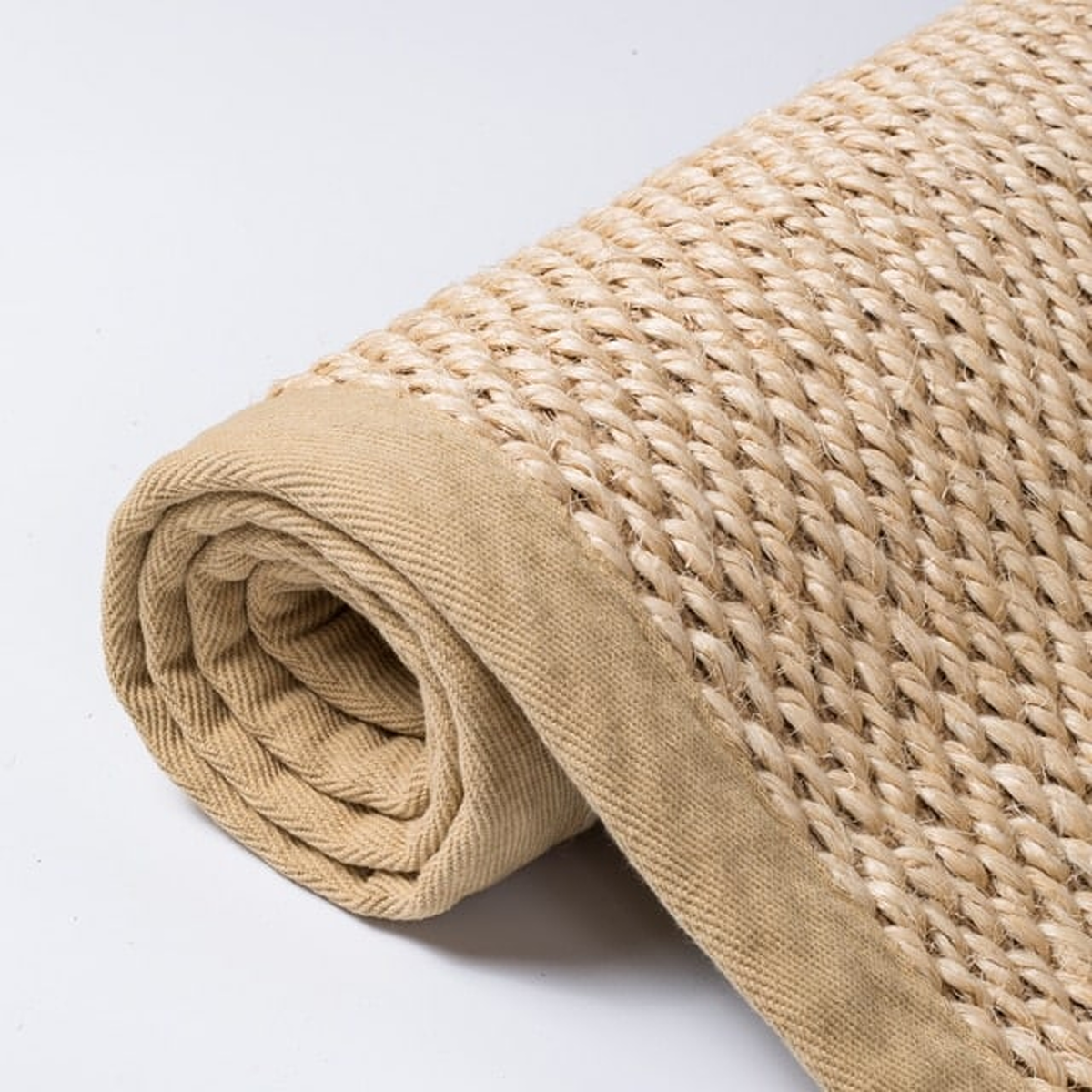 Tapis rectangulaire beige à tissage tressé avec bordure assortie