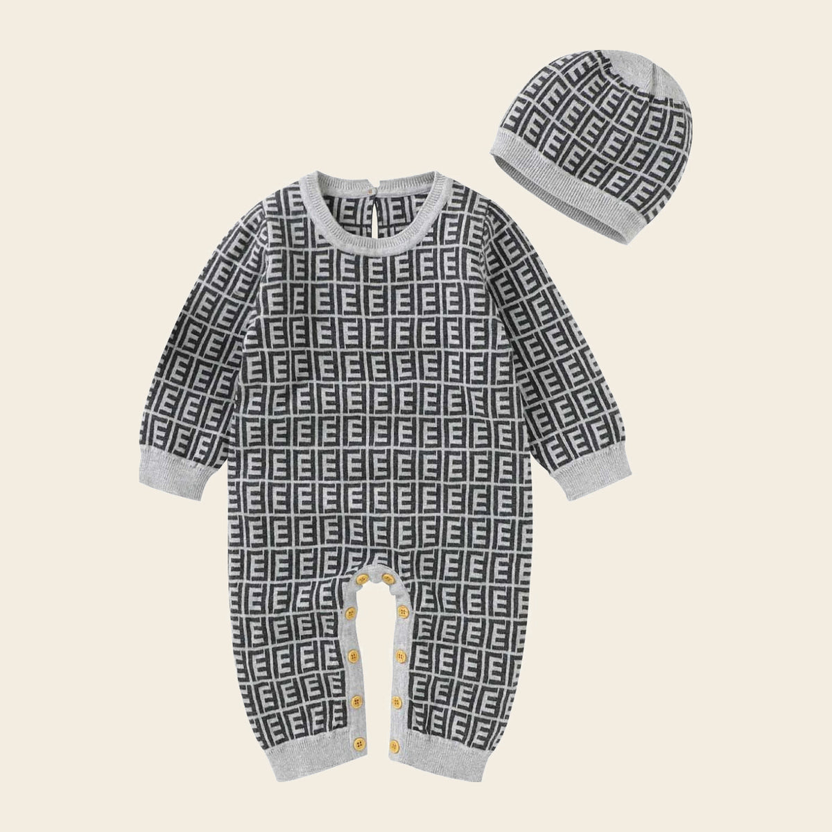 Barboteuse bébé grise à motif géométrique avec son bonnet assorti