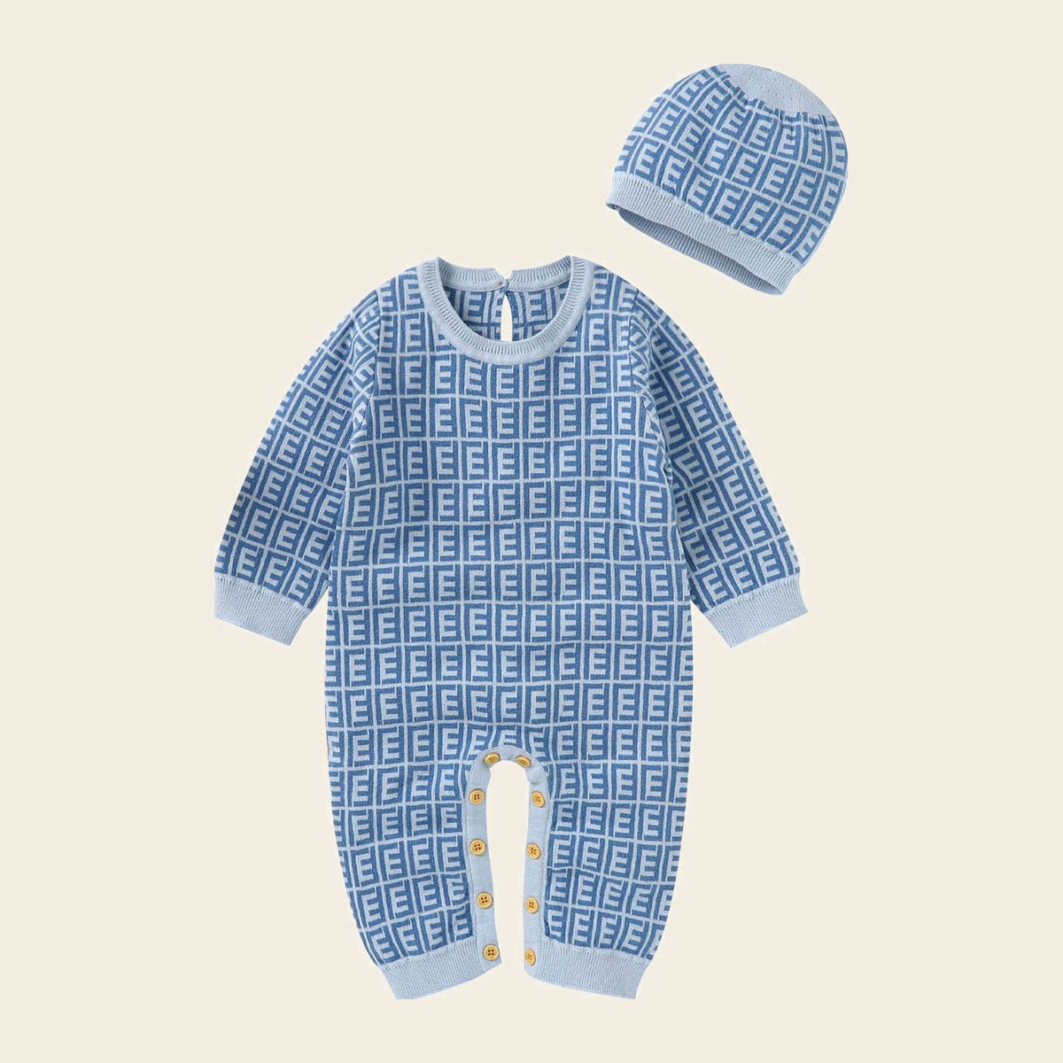 Barboteuse bébé bleue à motif géométrique avec son bonnet assorti