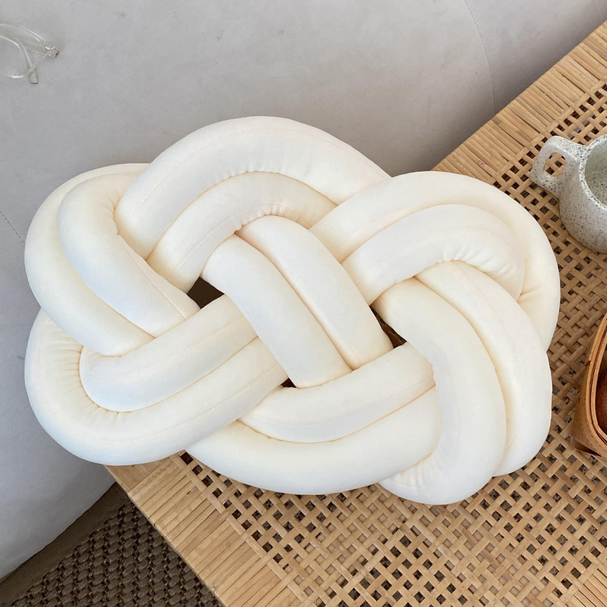 Coussin nœud en velours blanc