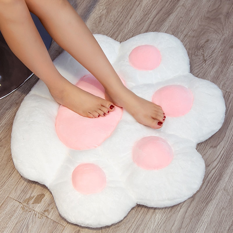 Coussin de sol en forme de patte de chat