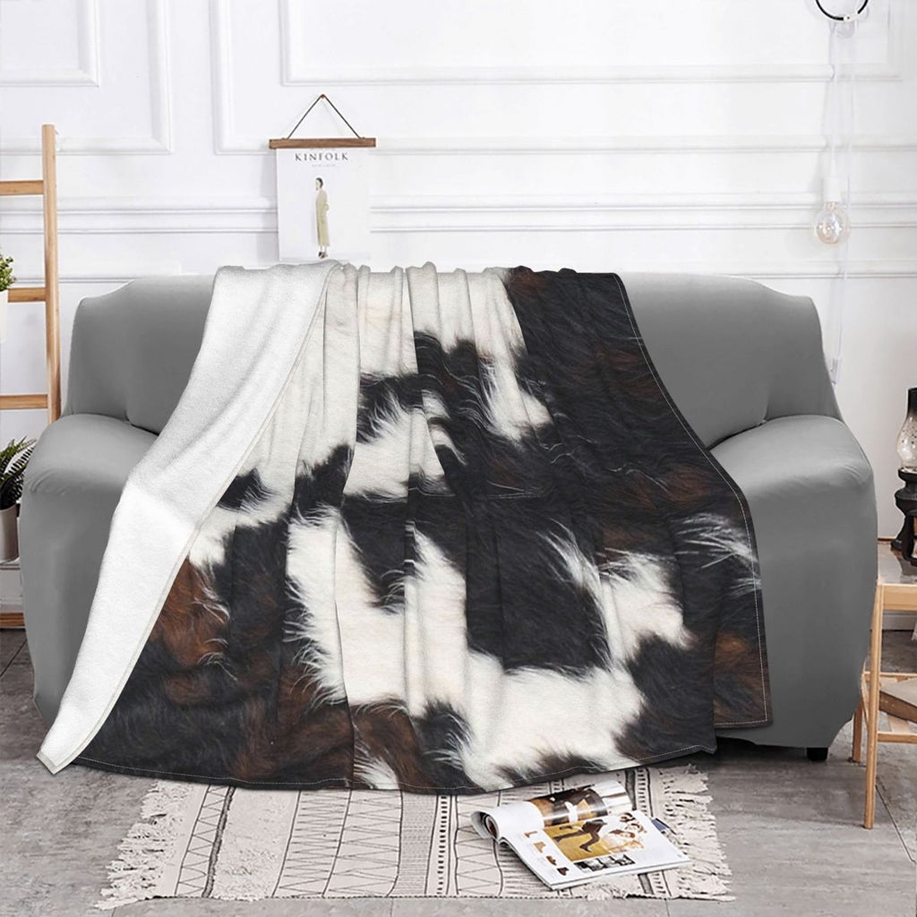 Plaid effet peau de vache