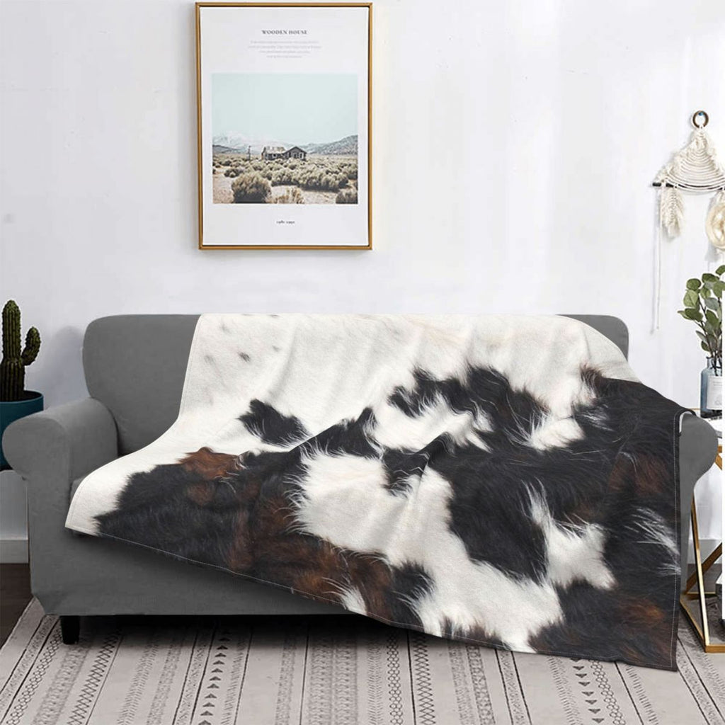 Plaid effet peau de vache