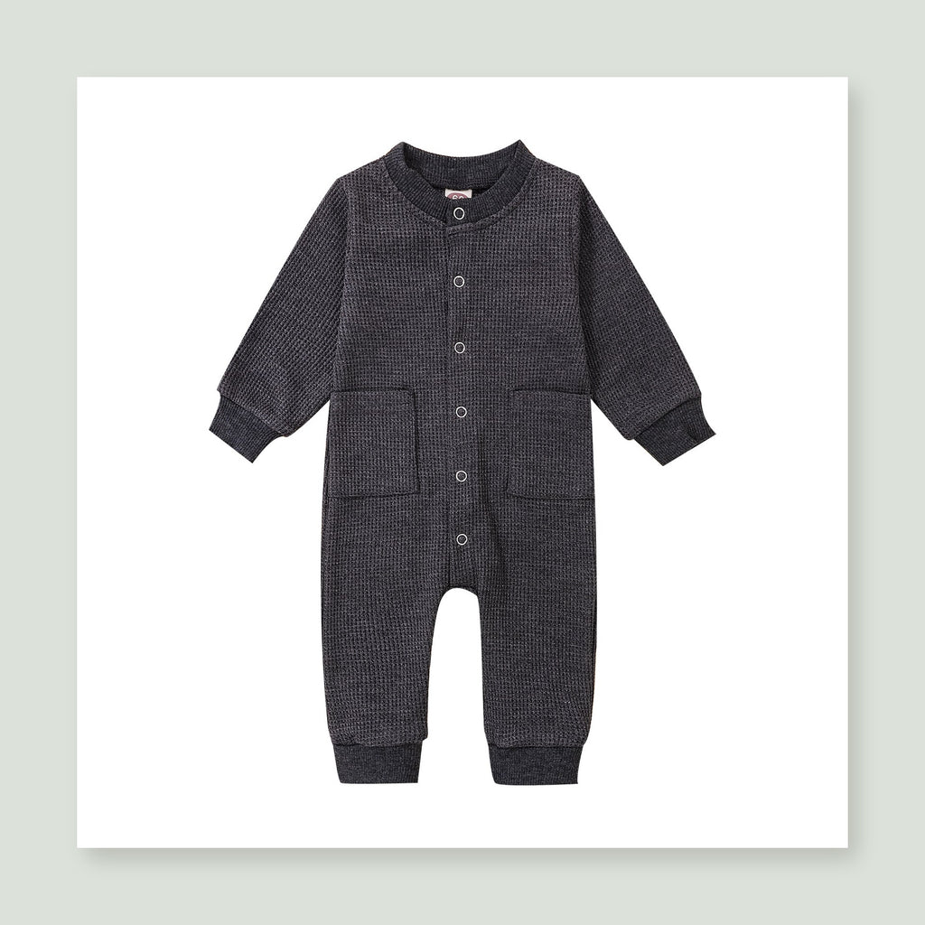 Vue entière de la barboteuse bébé gris anthracite en maille gaufrée