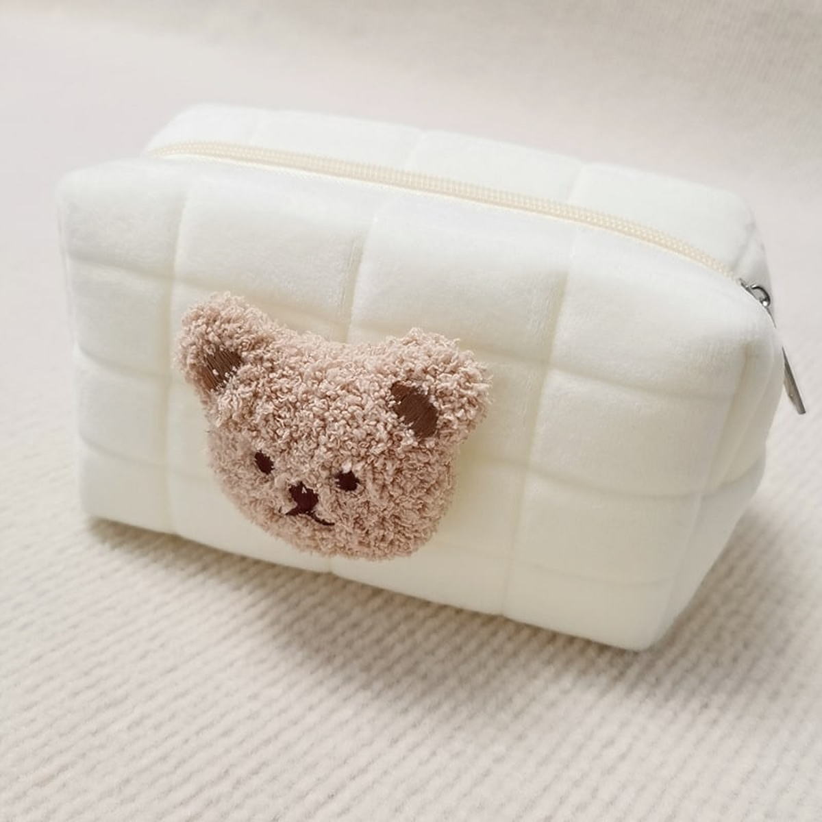 Trousse de toilette matelassée beige