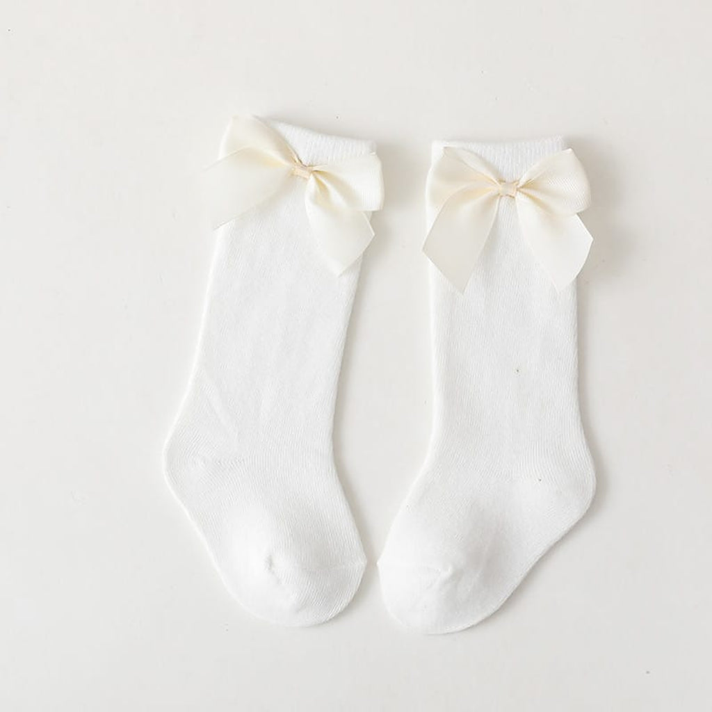 Paire de chaussettes hautes blanches a grand noeud pour enfant