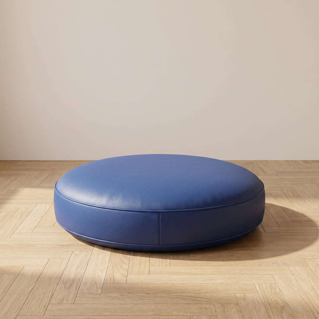 Coussin de sol rond en simili cuir bleu foncé