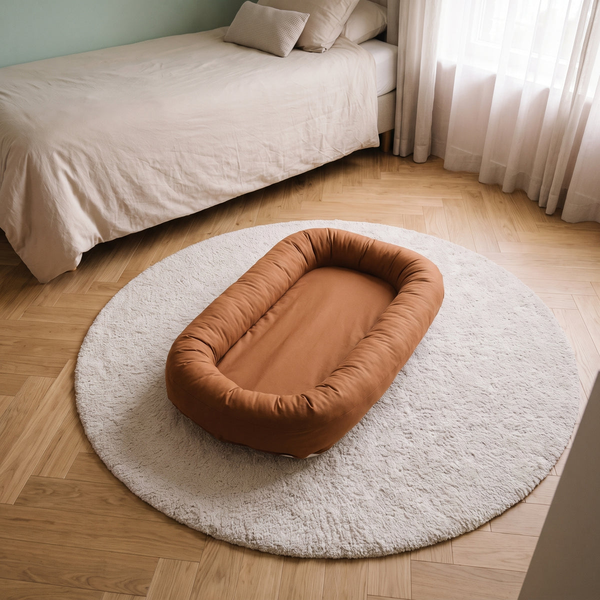 Bloc 1 : le couffin bébé posé au sol dans la chambre Image