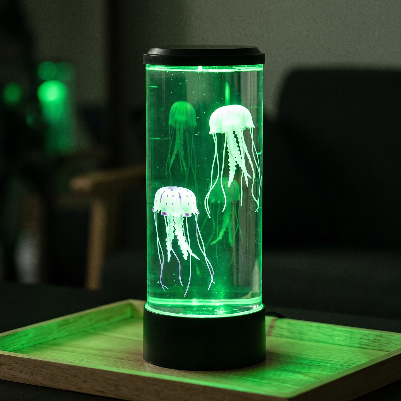 Lampe méduse éclairée en vert, les deux méduses à des hauteurs différentes Image