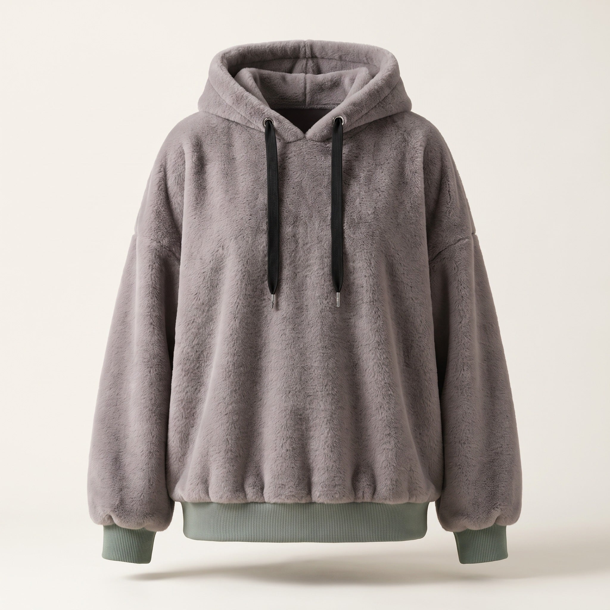 Le sweat peluche gris sur mannequin invisible, vu de face en entier : epaules tombantes, largeur du buste et bord-cote qui resserre le bas Image