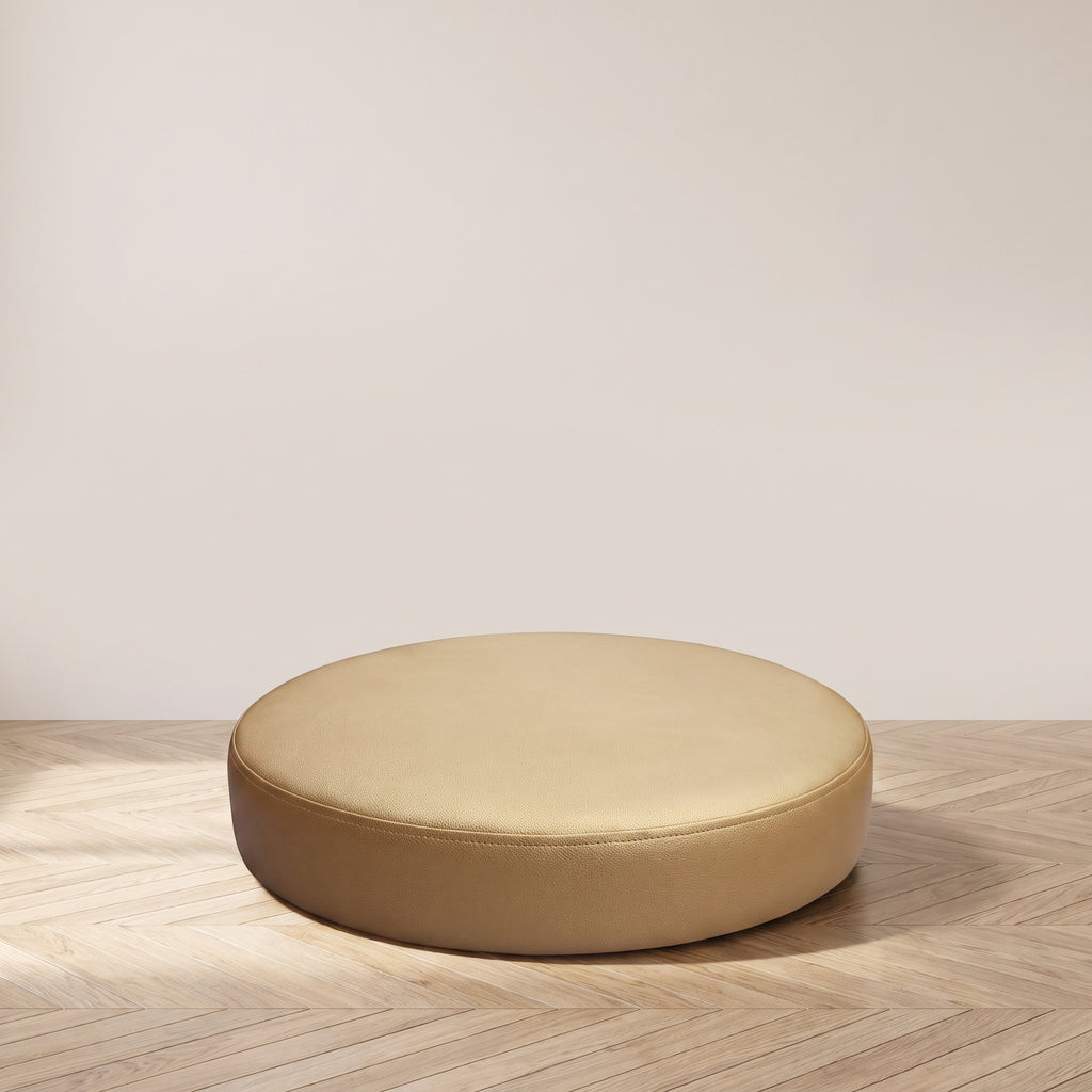 Coussin de sol rond en simili cuir camel