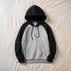 Sweat homme bicolore, Capuche gris et noir, posé à plat