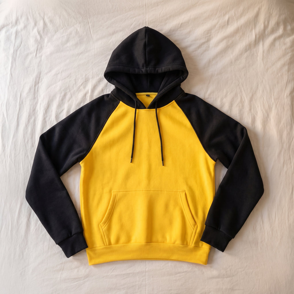 Sweat homme bicolore, Capuche jaune et noir, posé à plat