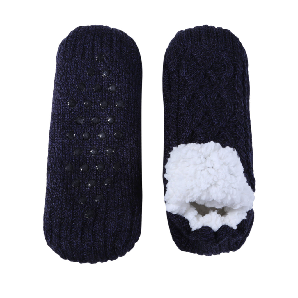 Chaussettes fourrées noires vues de dessus et semelle à picots antidérapants