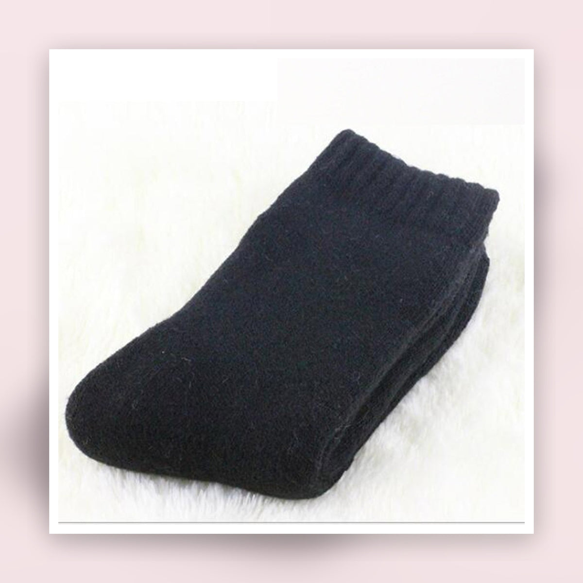 Paire de chaussettes épaisses noires pliée Image