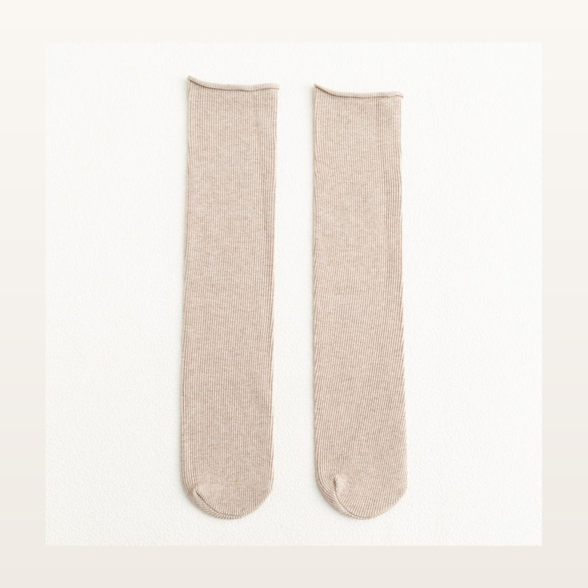 Paire de chaussettes longues unies beige à maille côtelée