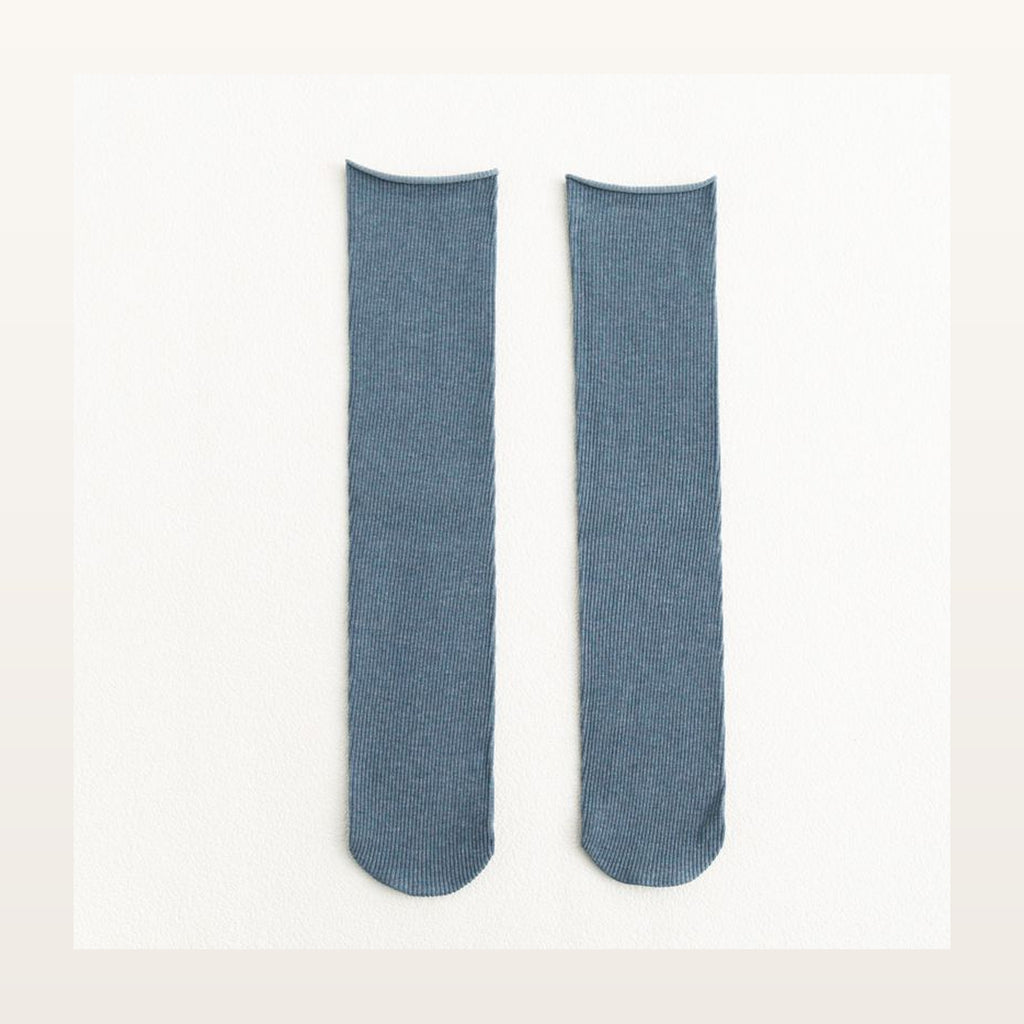 Paire de chaussettes longues unies bleues à maille côtelée
