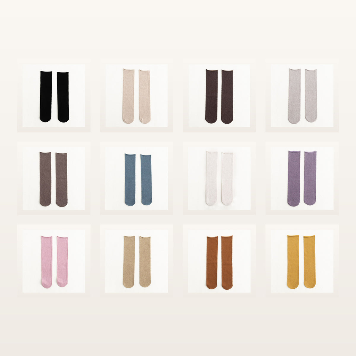 Les douze coloris des chaussettes longues unies présentés ensemble