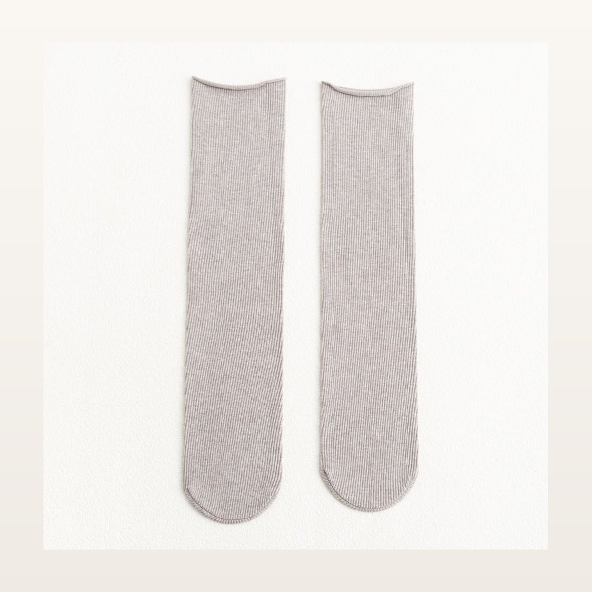 Paire de chaussettes longues unies grises à maille côtelée