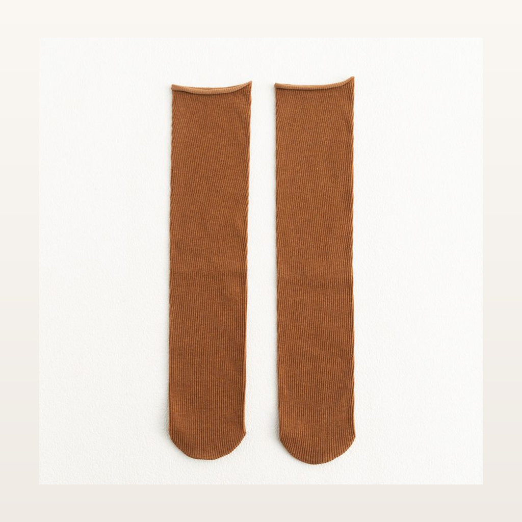 Paire de chaussettes longues unies orange à maille côtelée