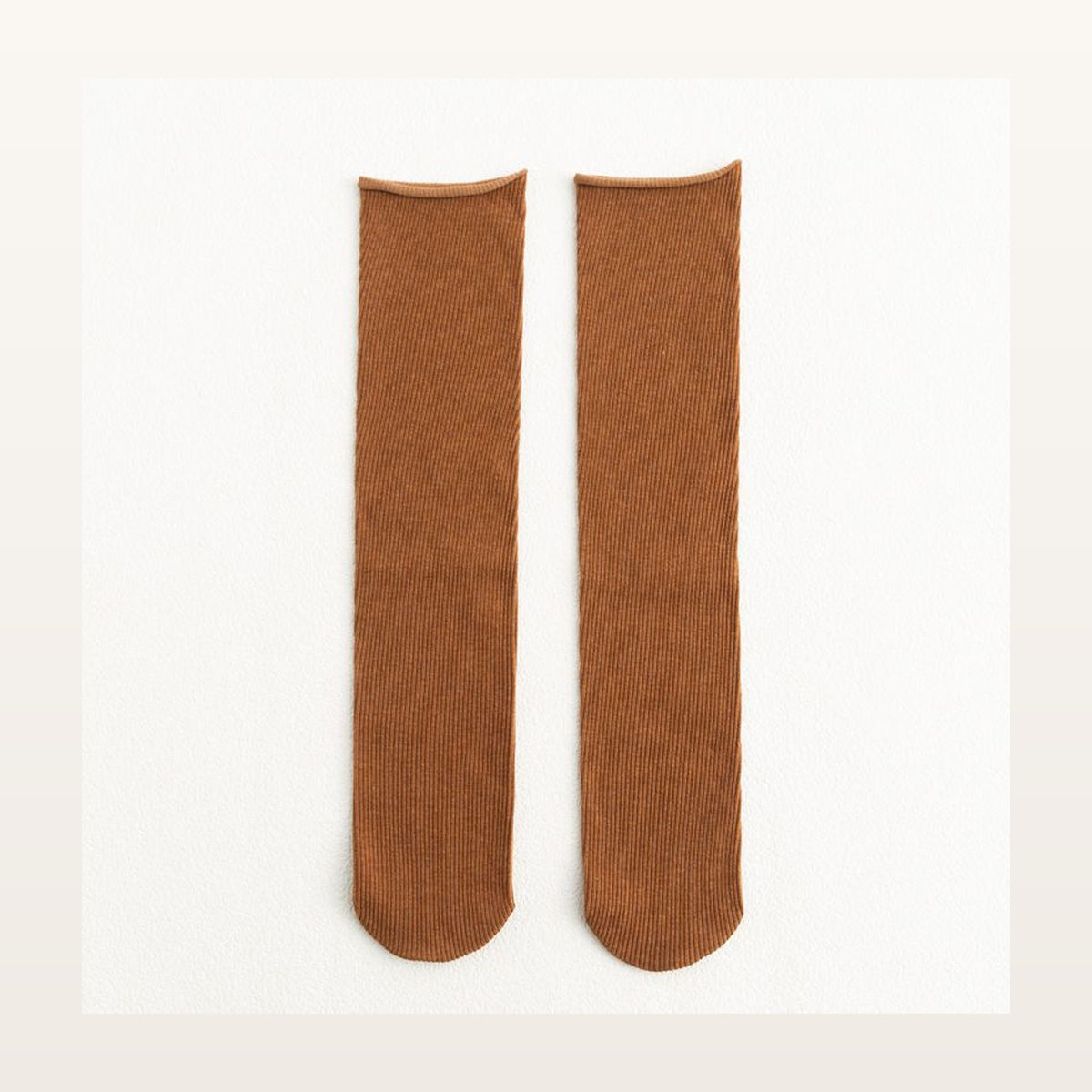 Paire de chaussettes longues unies orange à maille côtelée