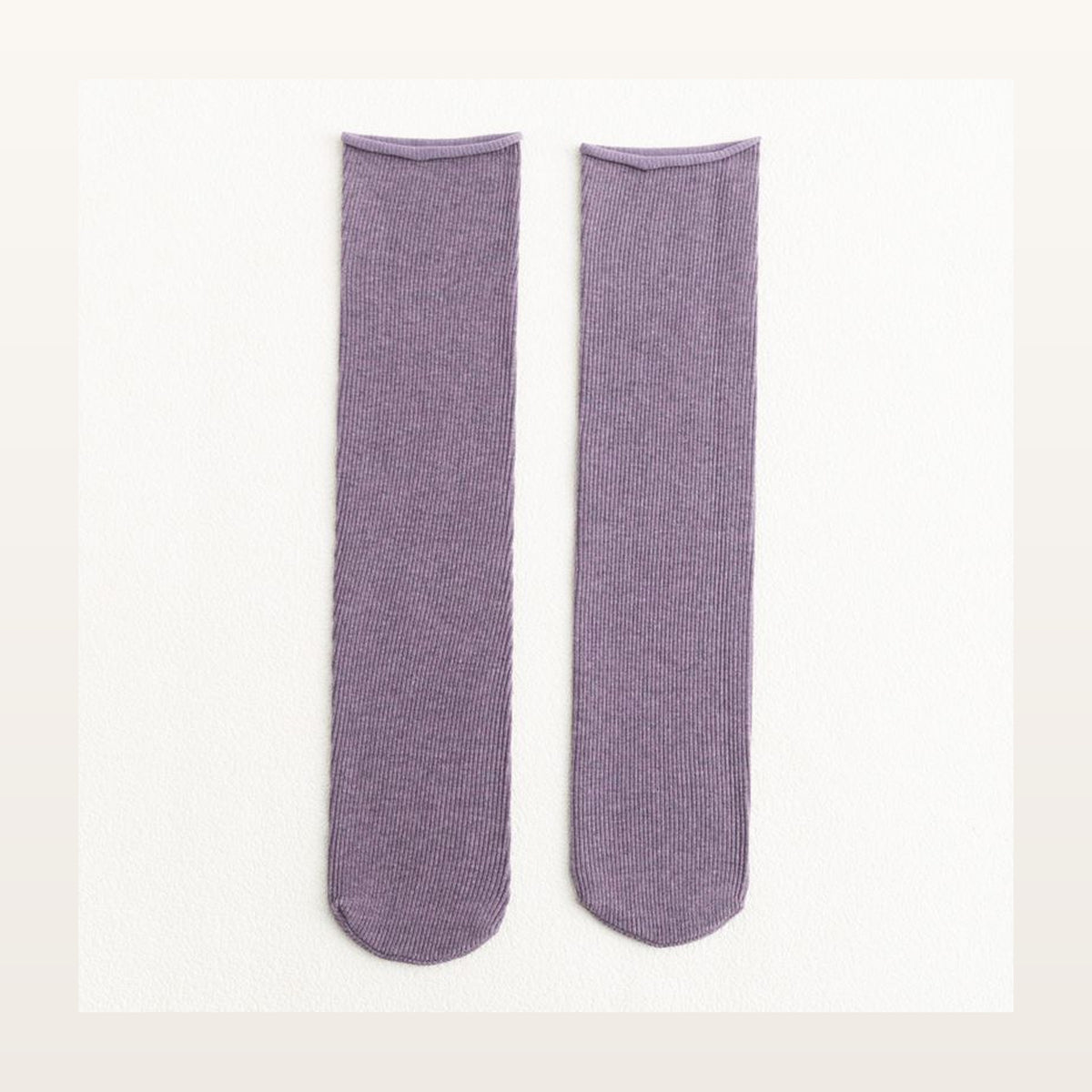 Paire de chaussettes longues unies violettes à maille côtelée