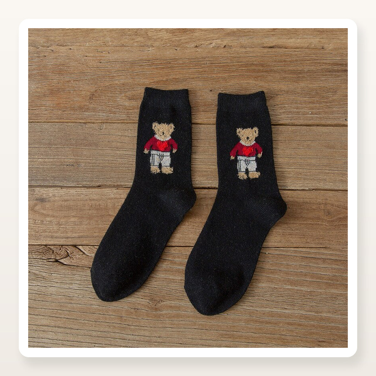 Paire de chaussettes noires à motif ourson