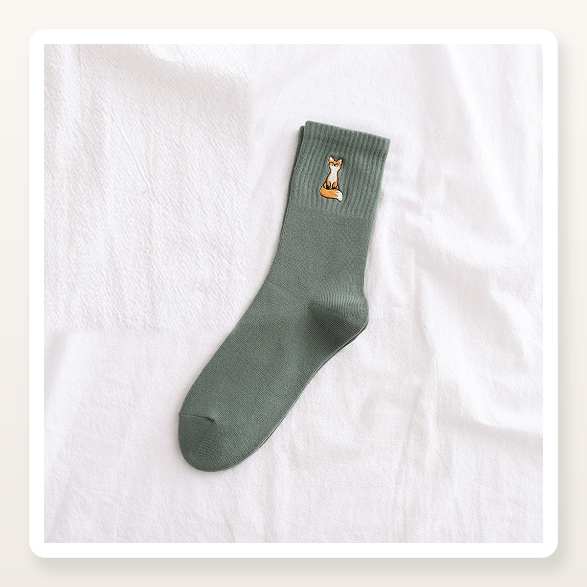 Chaussette verte en coton à renard brodé
