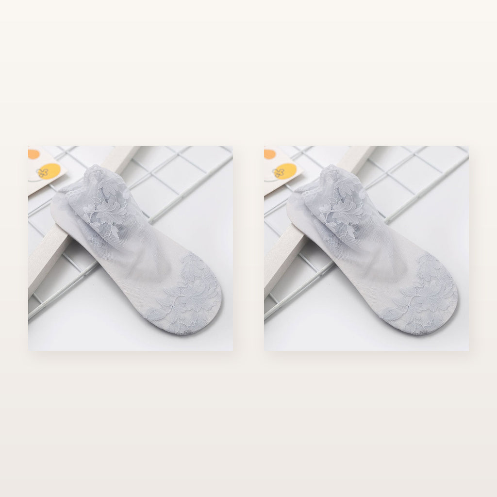 Paire de chaussettes transparentes grises à motif floral