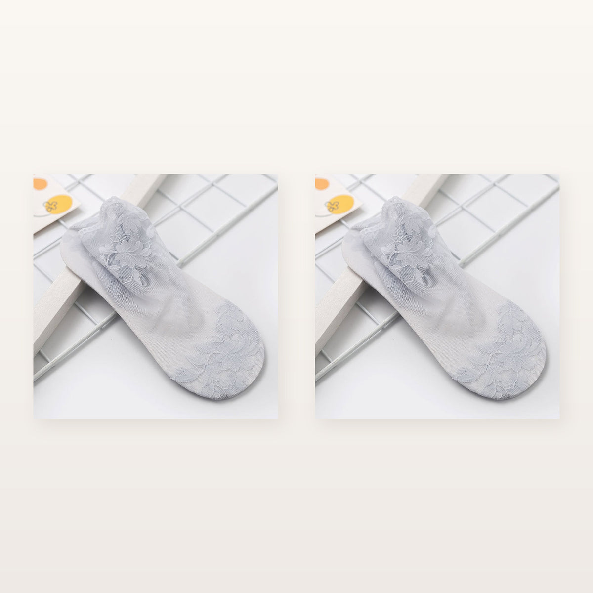 Paire de chaussettes transparentes grises à motif floral