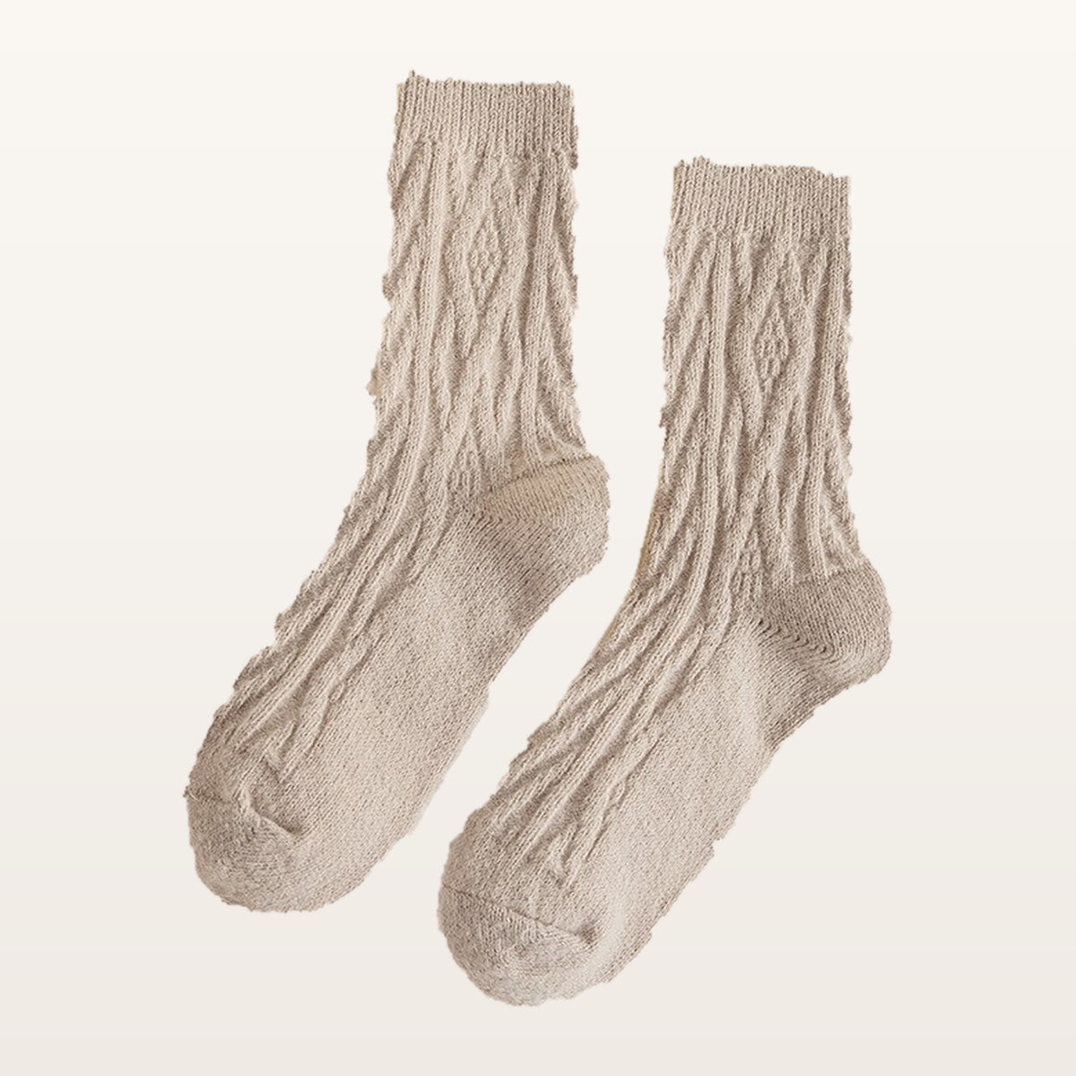 Paire de chaussettes tricotées beige à petites torsades