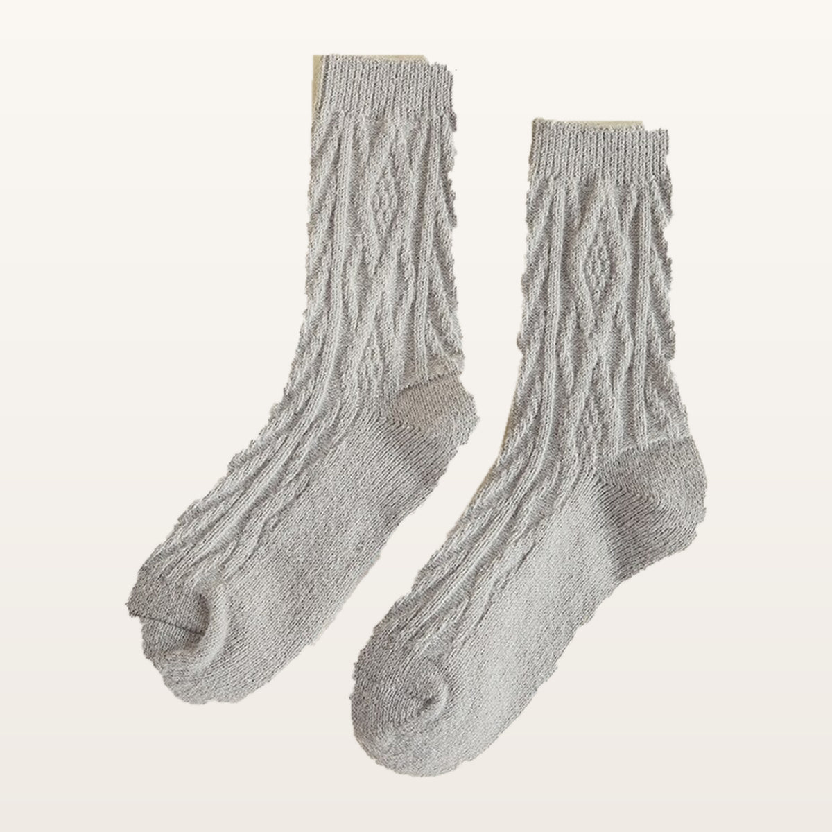 Paire de chaussettes tricotées grises à petites torsades