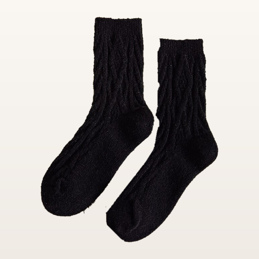 Paire de chaussettes tricotées noires à petites torsades
