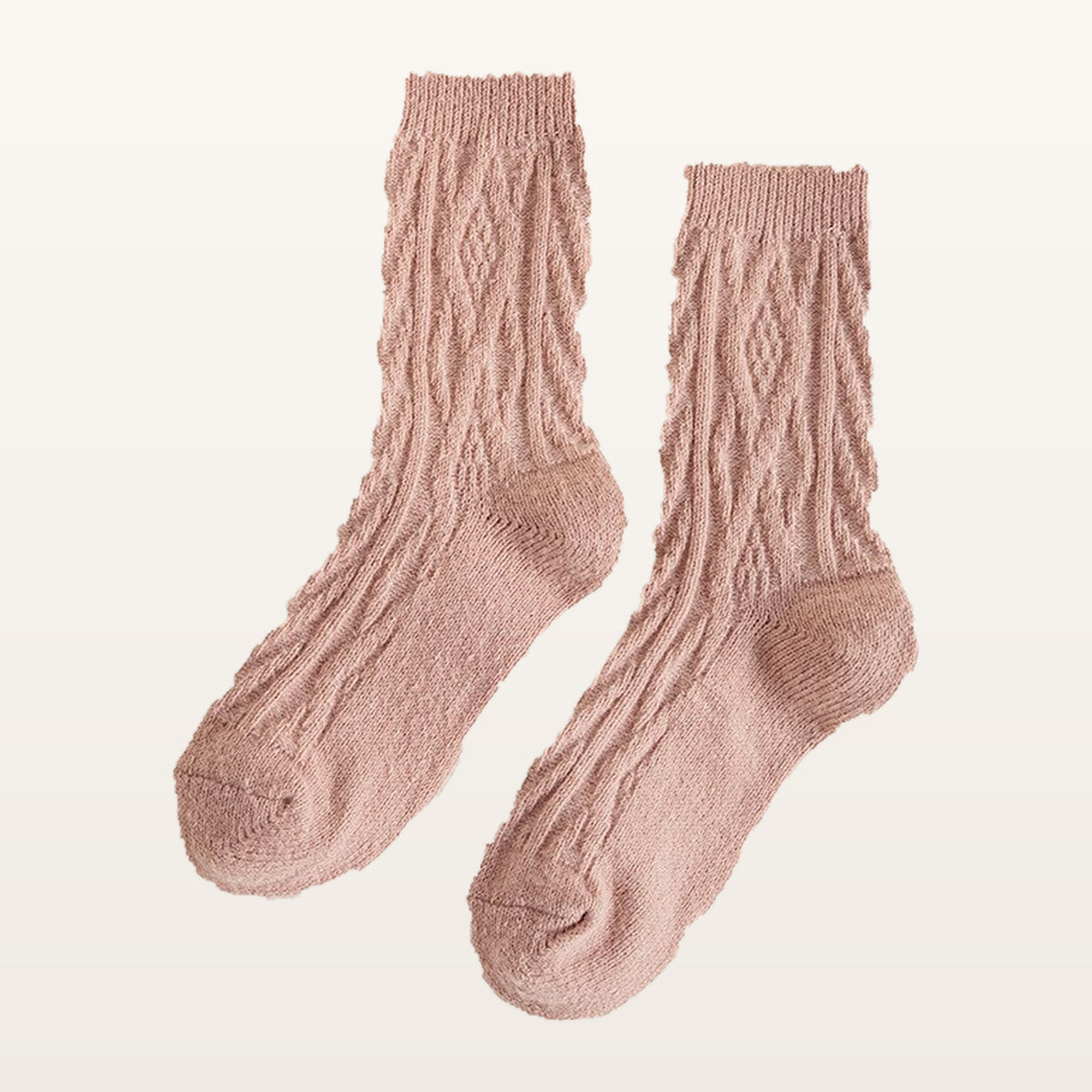 Paire de chaussettes tricotées roses à petites torsades