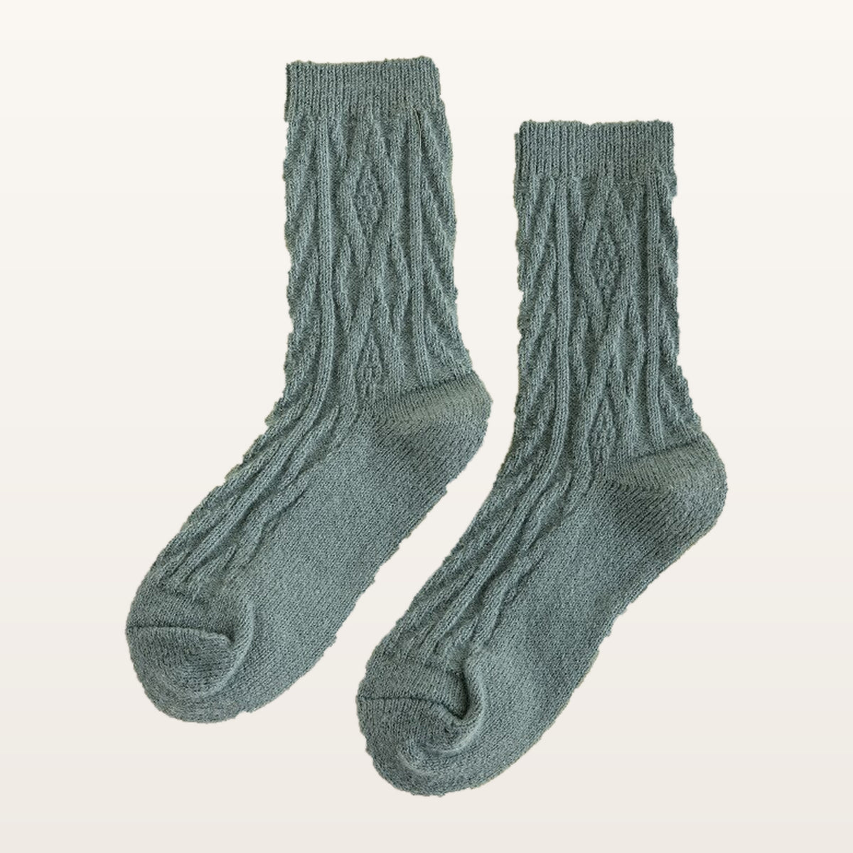 Paire de chaussettes tricotées vertes à petites torsades