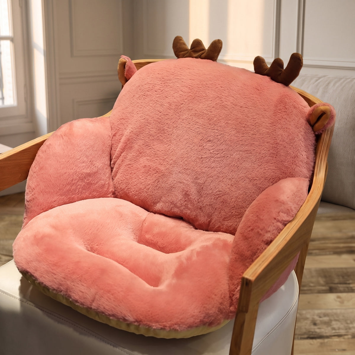 Détail du capitonnage et du relief pelucheux du coussin rose Image