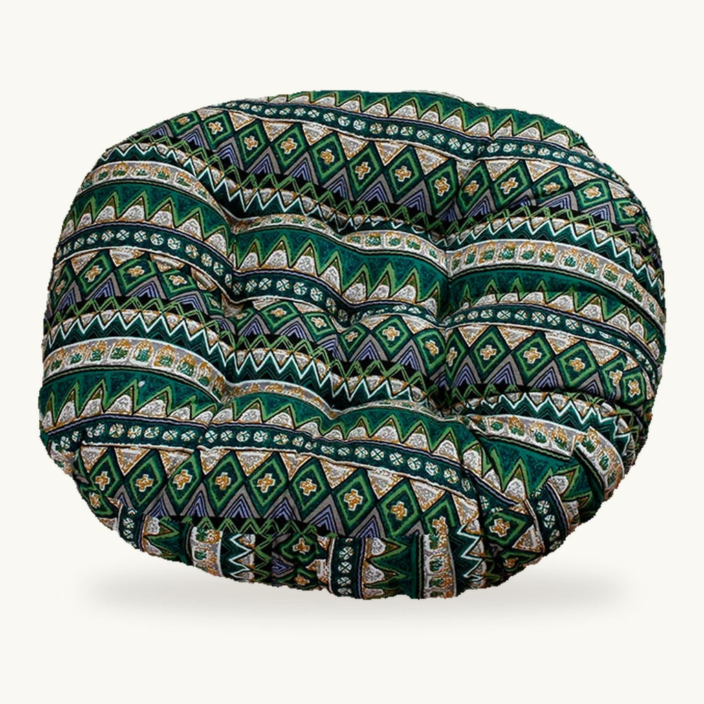 Coussin de sol rond capitonné à motif géométrique vert sur fond clair