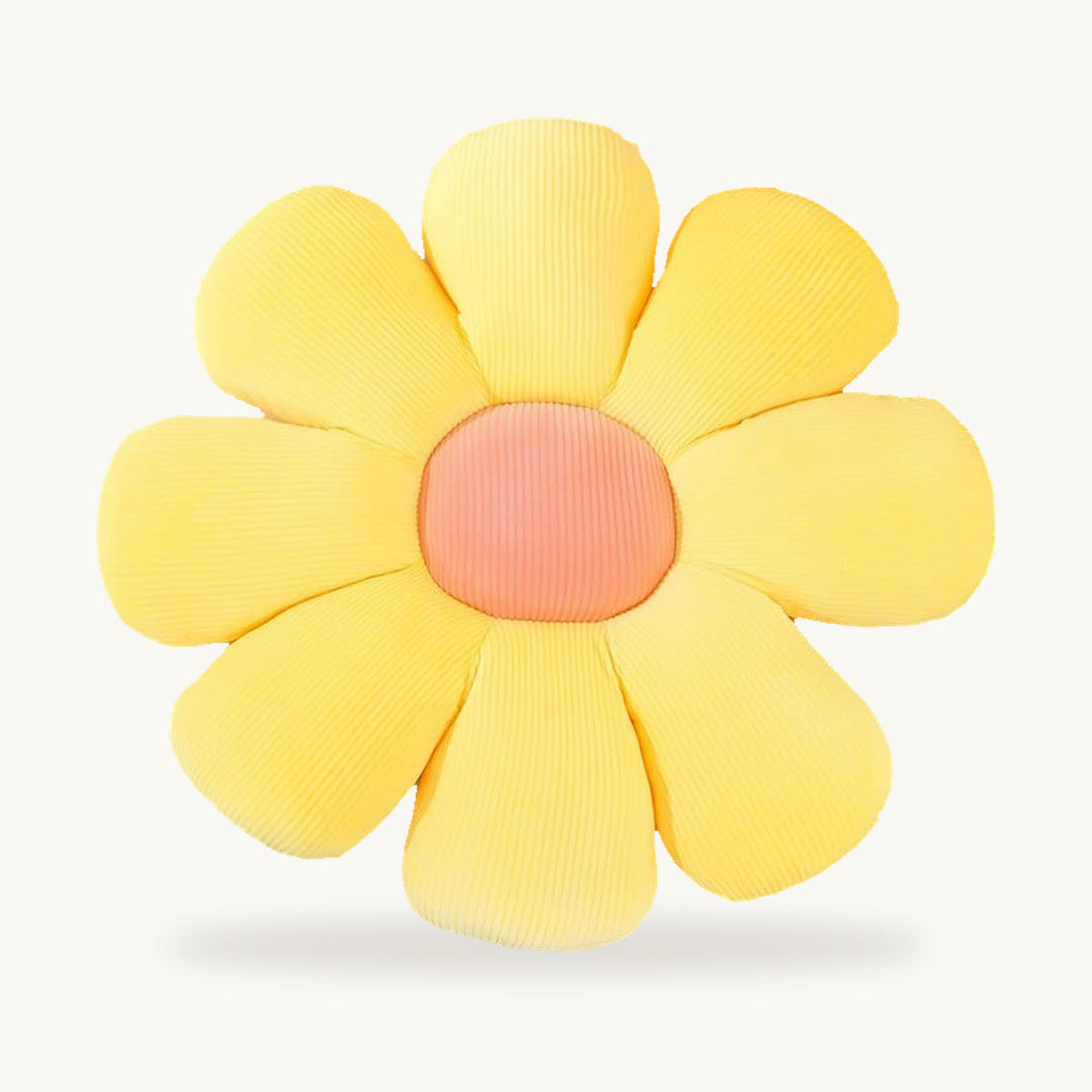 Coussin fleur jaune à huit pétales et centre rose vu de face
