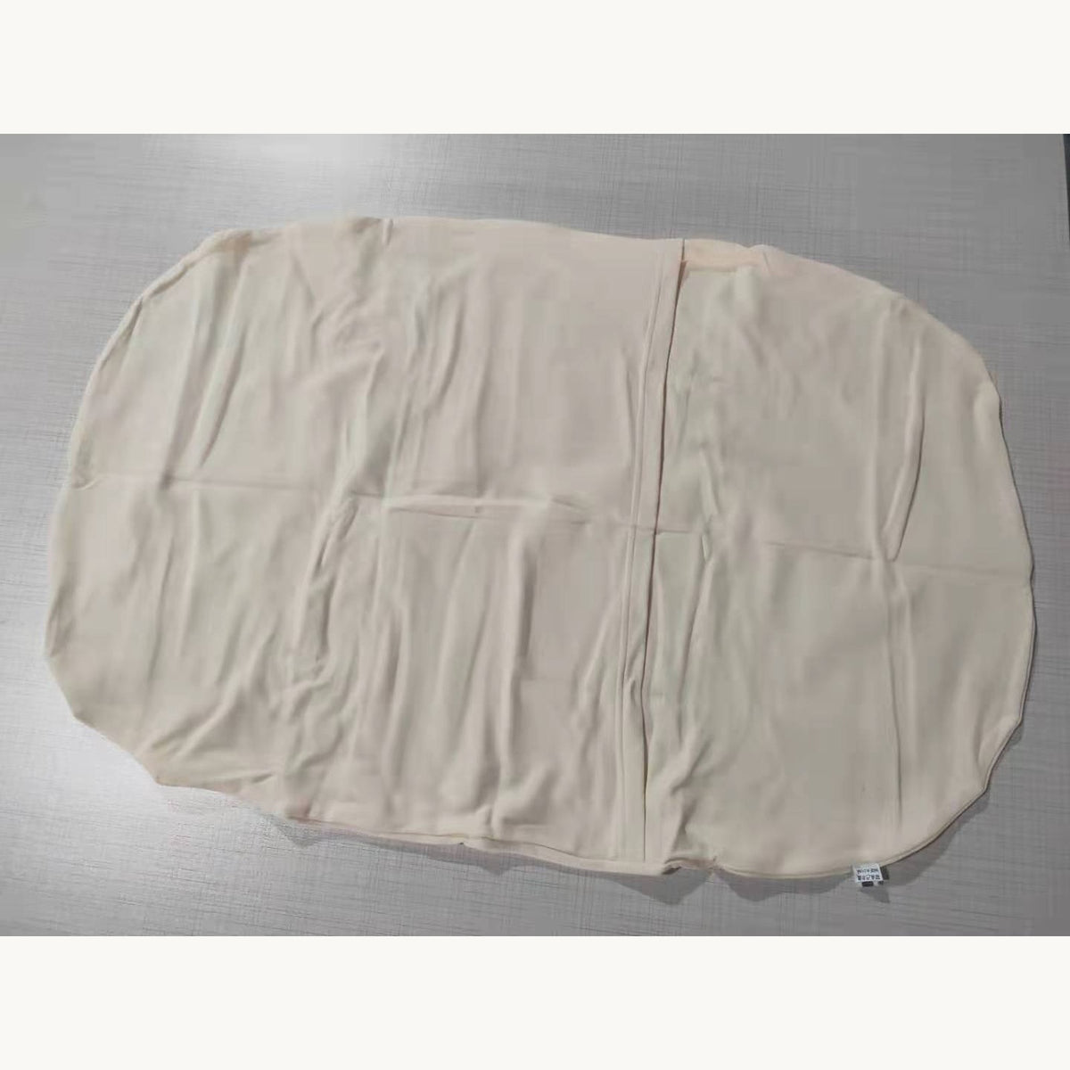 Couverture bébé beige vue à plat