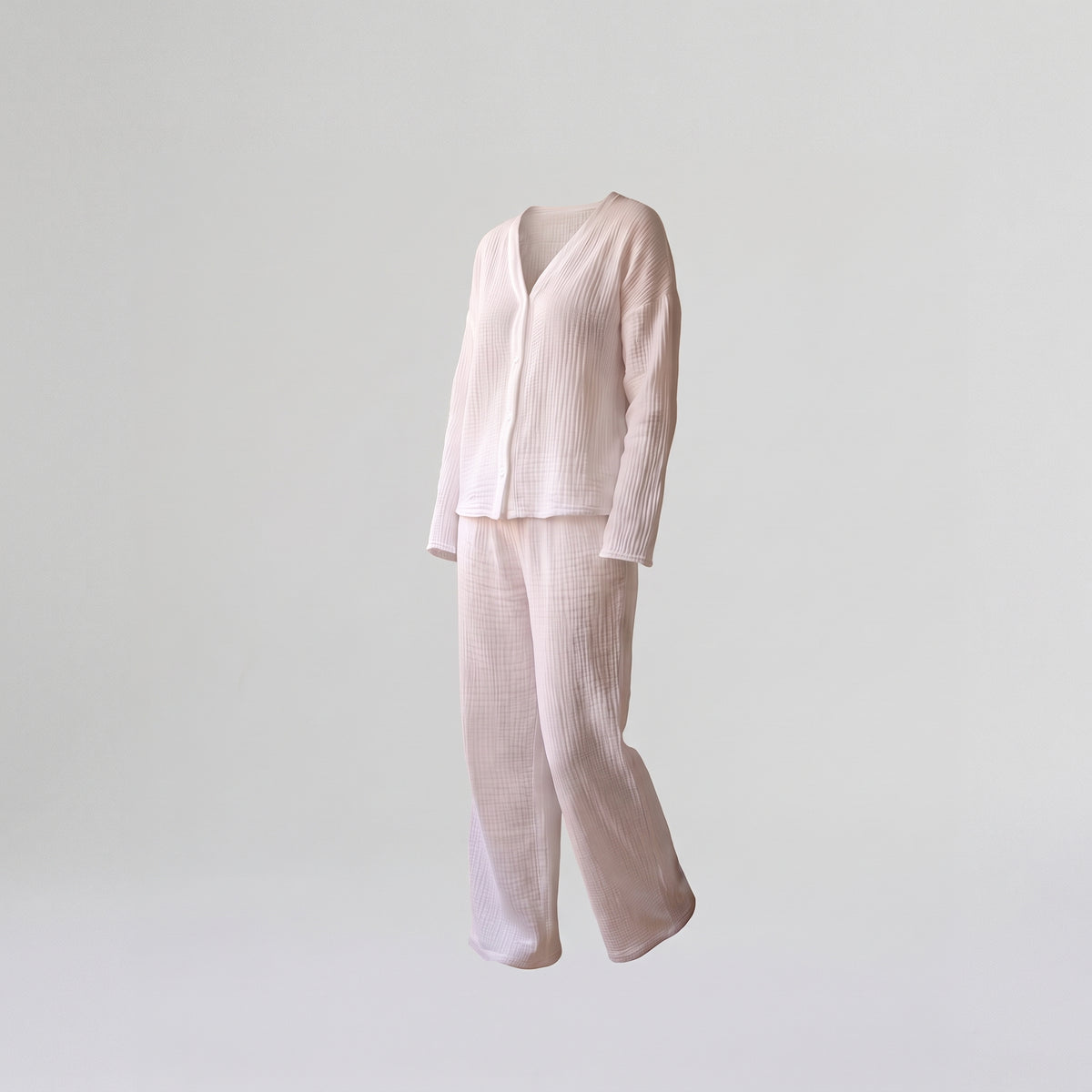 Ensemble en gaze de coton blanc sans mannequin, fond uni Image