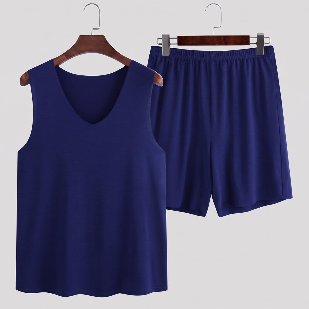 Packshot du pyjama homme bleu foncé avec débardeur à col V et short.