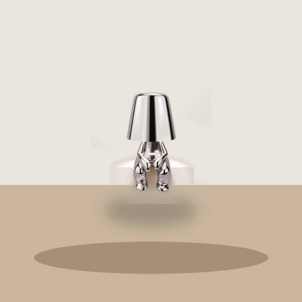 Lampe figurine modèle Joe en finition argentée