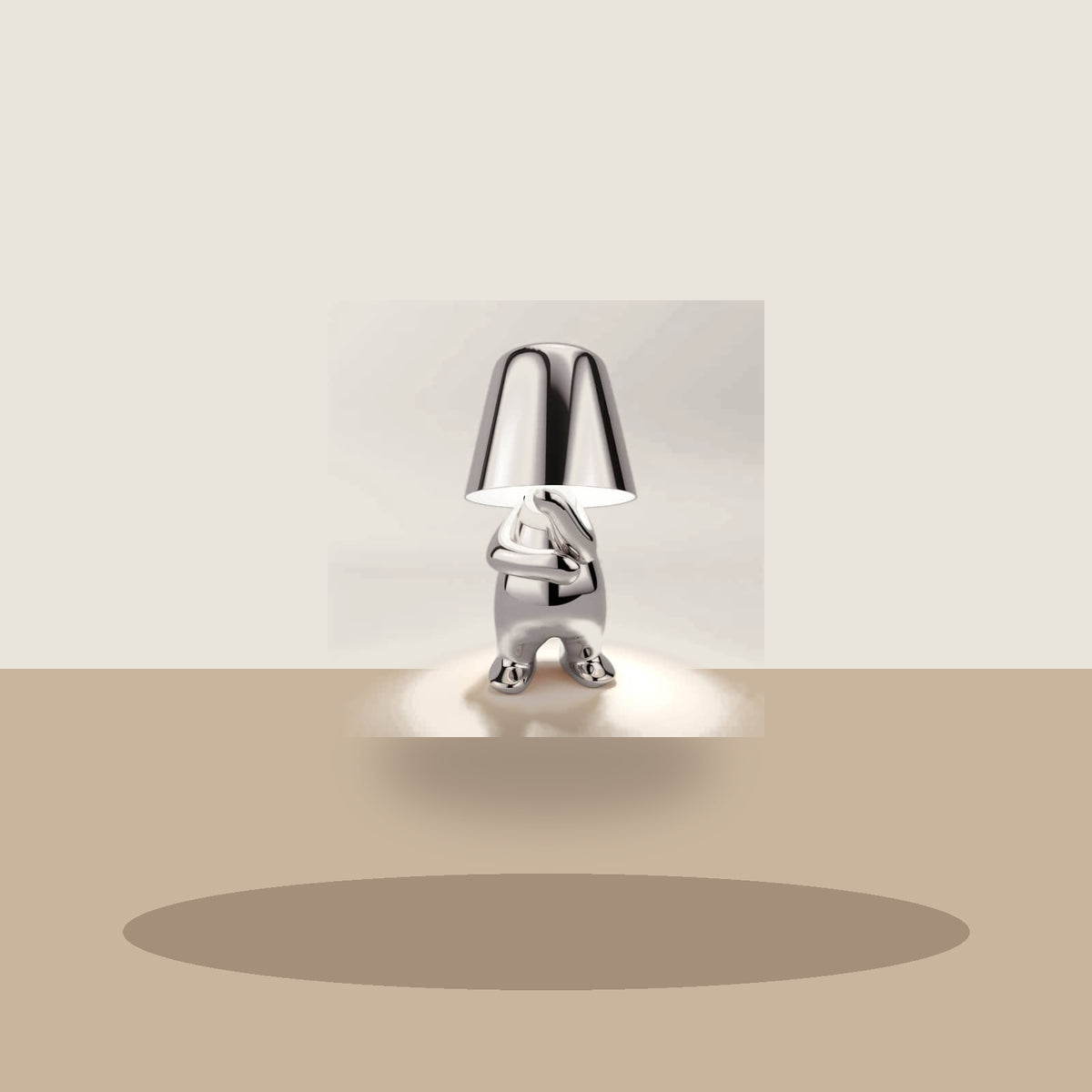 Lampe figurine modèle Ran en finition argentée