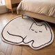 Tapis en forme de chat, écru au trait noir, modèle Chat endormi, posé en descente de lit
