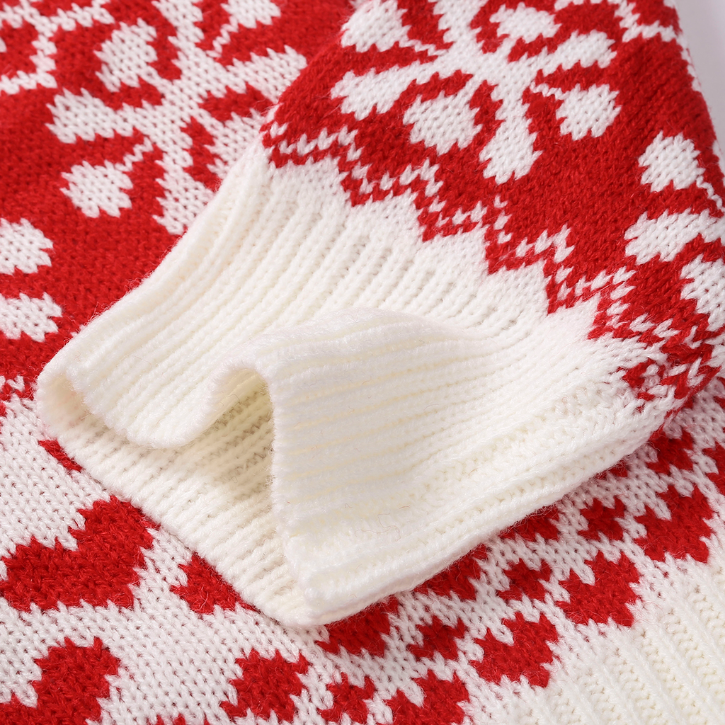 Détail du poignet côtelé du pull de Noël femme